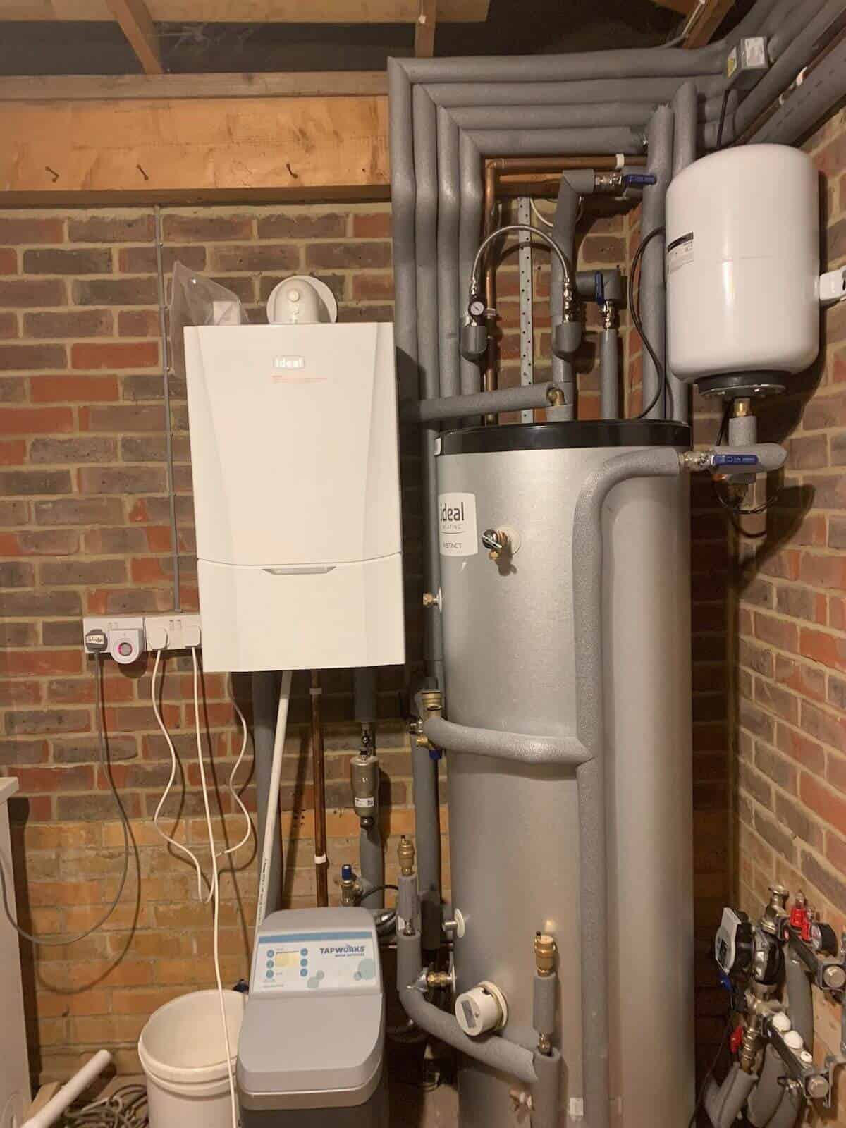 System boiler installed alongside a hot water cylinder in a Cambridge home
